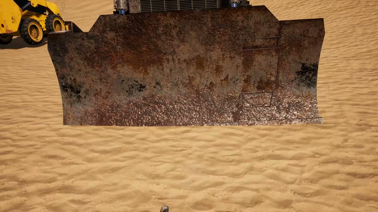 A bulldozer pushing a big heap of sand