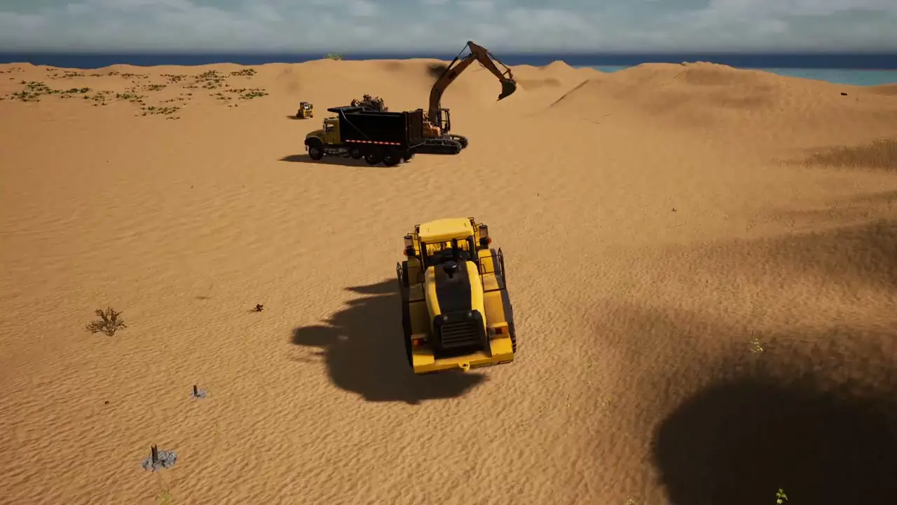 A wheel loader driving across the island