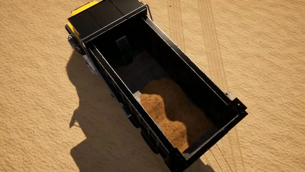 A dump truck tipping its load